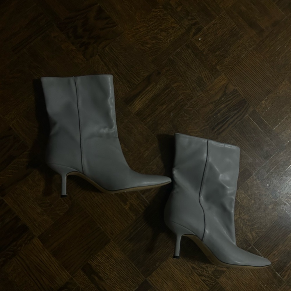 Grey leather pointed heel boots